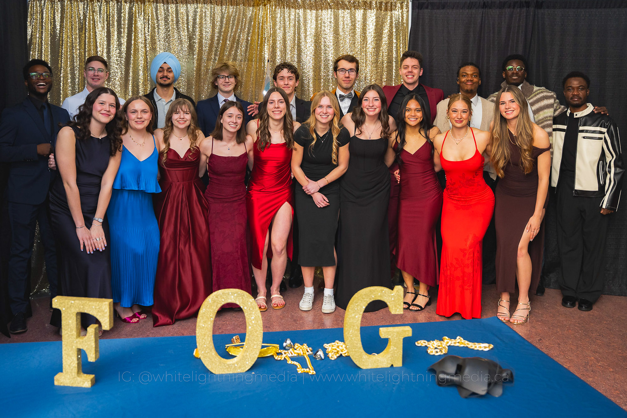 A group of smartly dressed, happy Wolves athletes posing at the 2026 Festival of Gold event 