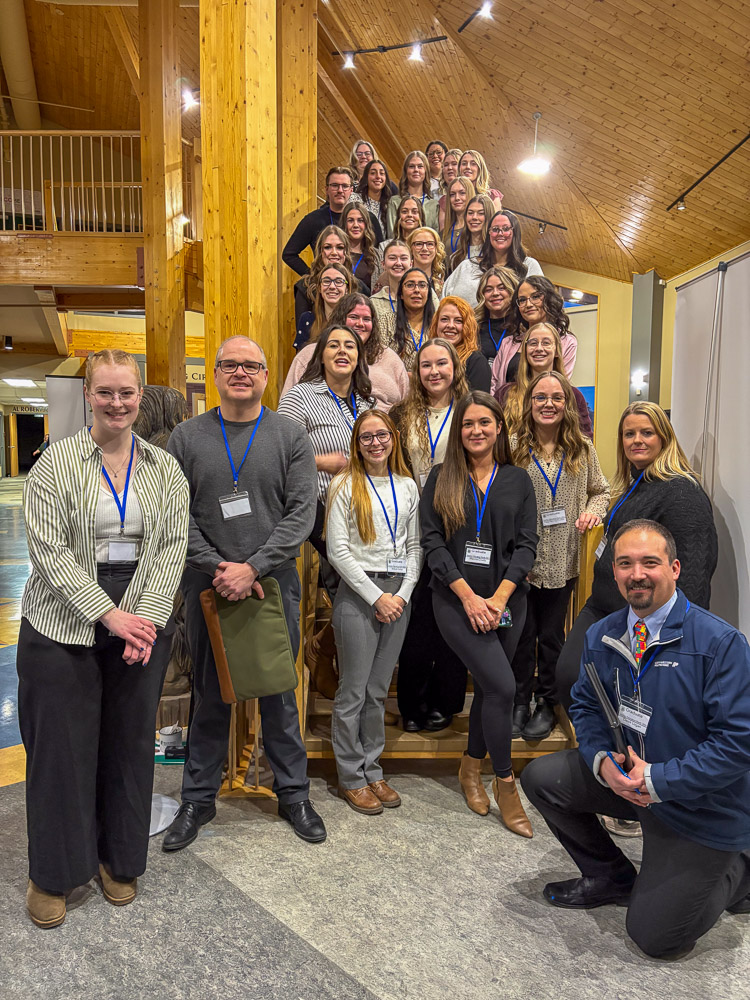 Fall and Winter Semester mentor teachers posing on a staircase