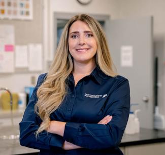 Kristy Honing, Vet Tech program instructor posing in a lab