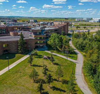 Aerial view of Grande Prairie Campus on a bright sunny summers day