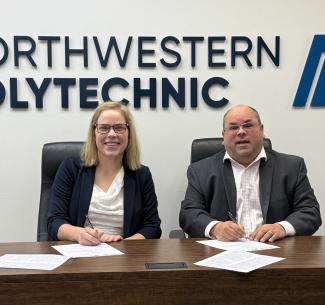 NWP President and CEO, and Mike McMann, FVSD Superintendent sat side by side after signing the MOU