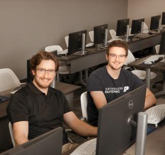 Computing science student, Ethan and Owen Rowney in the computer lab 