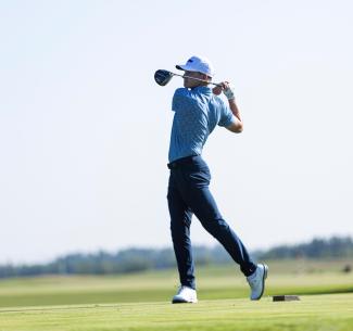 Nathan Barendregt in finished position after driving a ball of the tee box