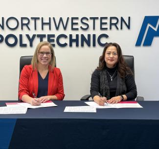 Dr. Vanessa Sheane, President and CEO of NWP and Dr. Judy Kim-Meneen, Executive Education Director, Tallcree Education Authority