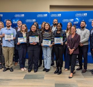 NWP Business Administration students and faculty pose in a group photo with members of the Grande Prairie & District Chamber of Commerce