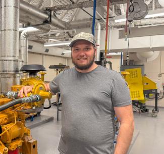 Kevin Young standing in the Millwright lab