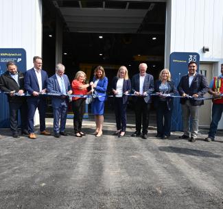 Alberta Premier, Danielle Smith, flanked by NWP Chair, Shawna Miller (L) and NWP President and CEO, Vanessa Sheane cut the ribbon to officially open the NWP Skilled Trades Training Centre (R)