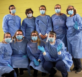 Anna van der Giessen (top middle) with co-workers.