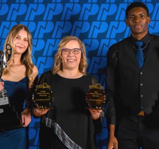 NWP Wolves Athletes of the Year, Evangeline Zeyha (L) and Emmanuel Iloka (R) pose with NWP President and CEO, Dr. Vanessa Sheane