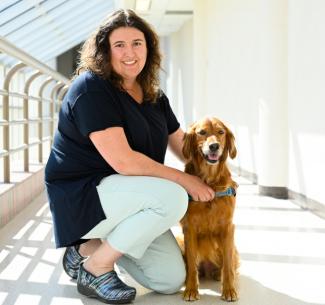 Kianna Lindsay and registered therapy dog, Sadie
