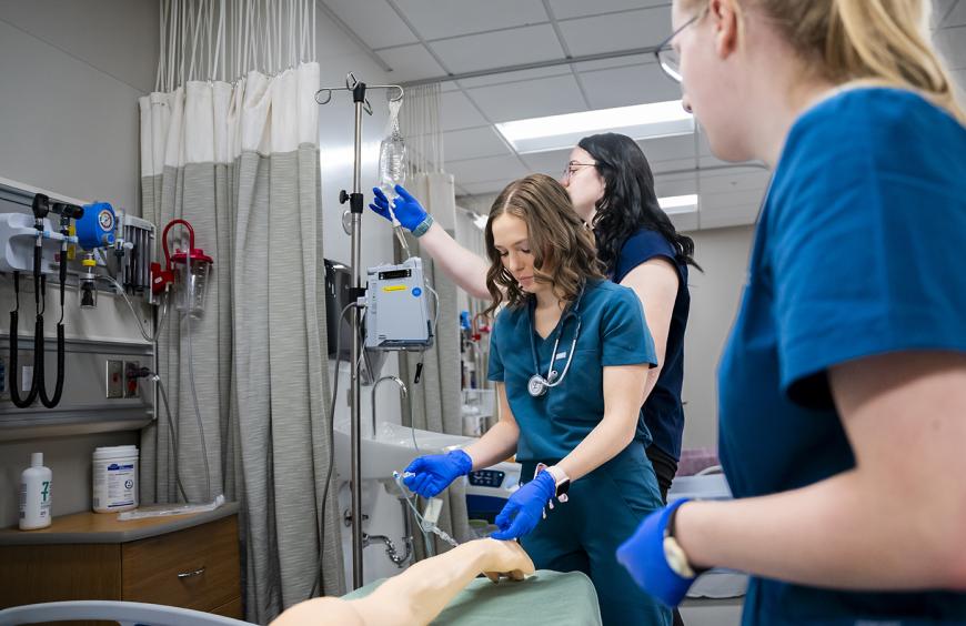 Nursing students training in the simulation lab