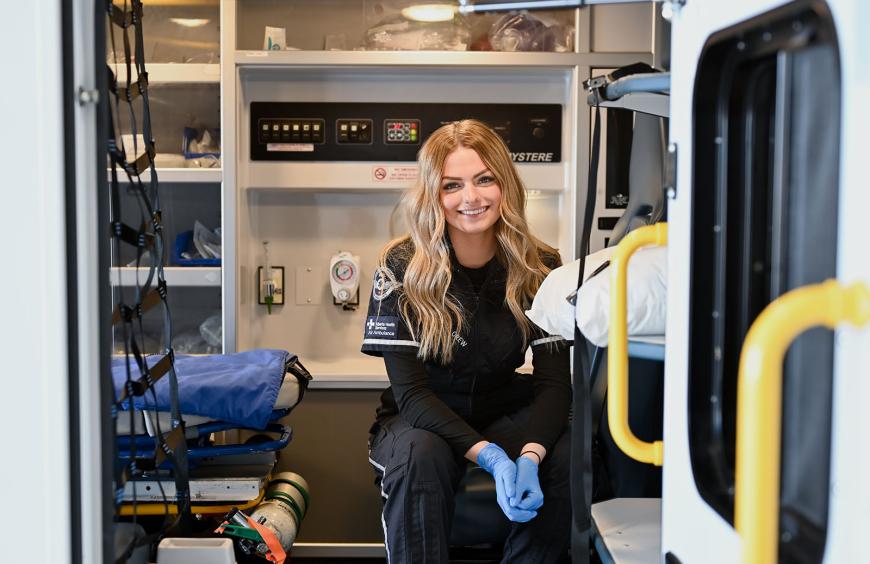 Paramedic sitting in an ambulance
