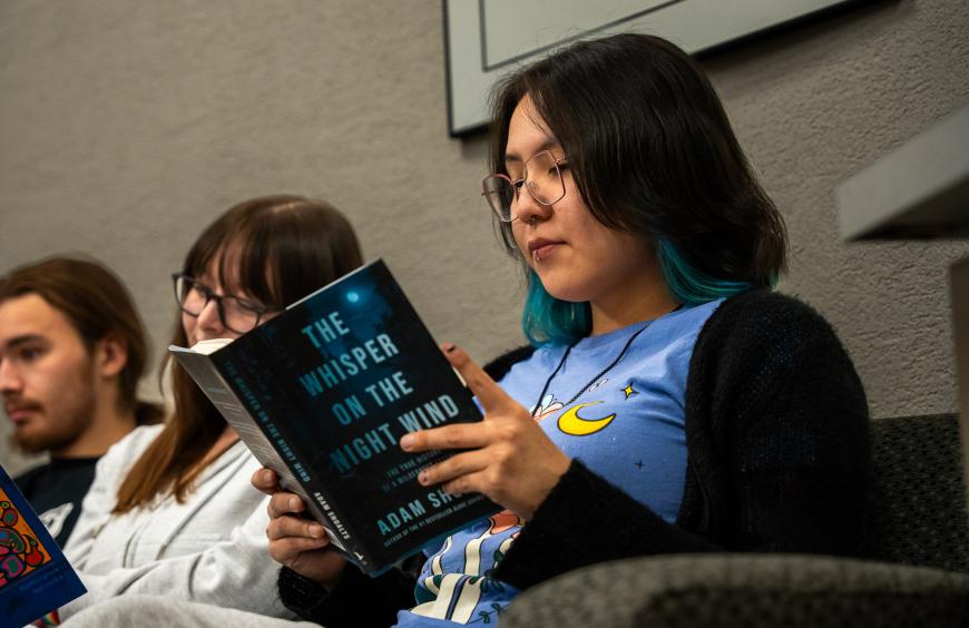 Student group reading in the library