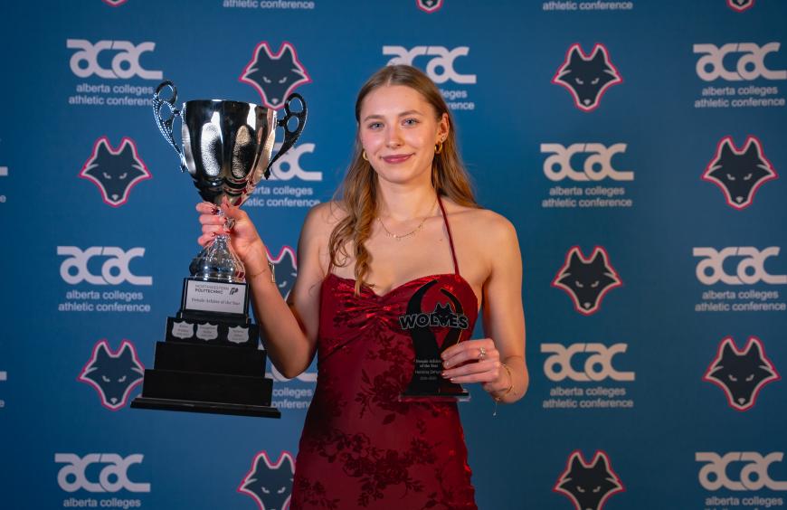 Helaina Zeyha posing with her Athlete of the Year trophy at the Wolves Festival of Gold Awards Ceremony