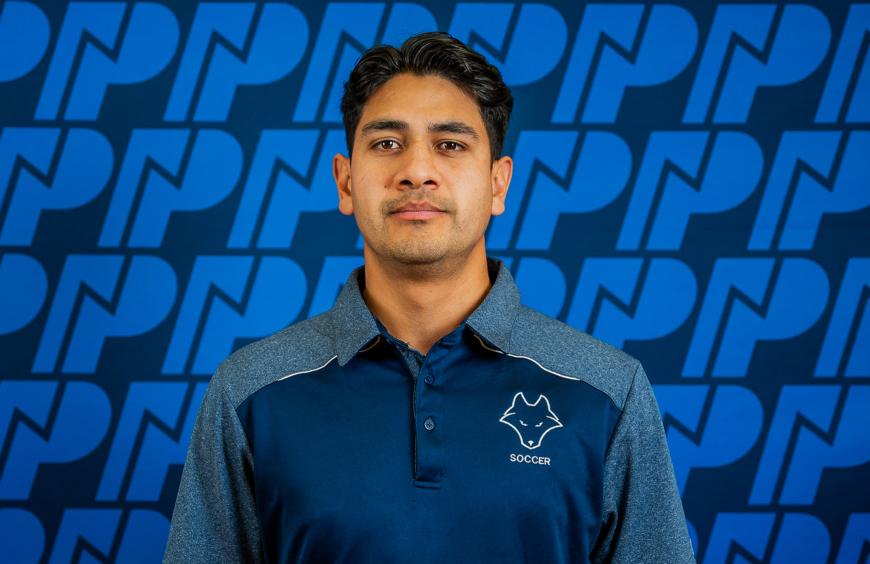 Men's soccer head coach, David Rojas