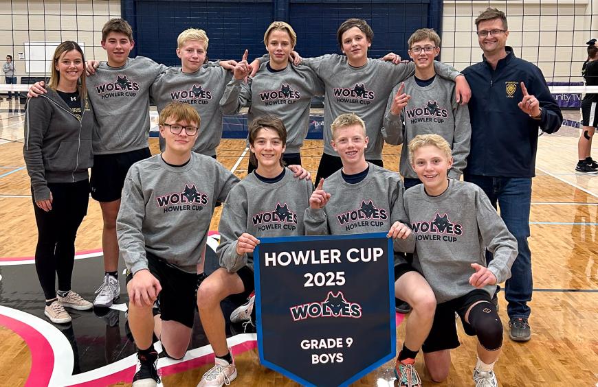 The GP Christian school grade 9 boys volleyball squad posing in the NWP gym holding up their championship banner