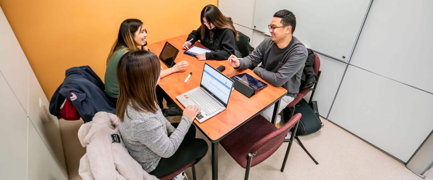 A group of students studying in a library