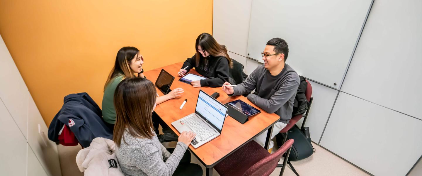A group of students studying in a library