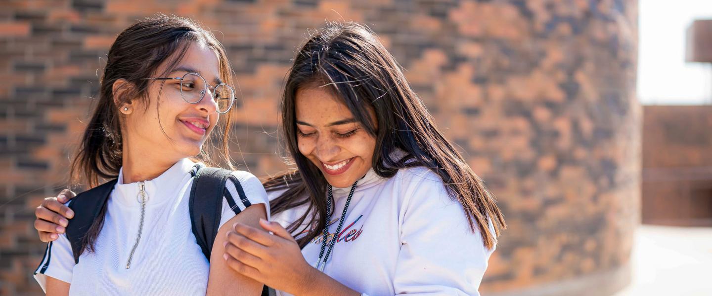 Happy international students enjoying a warm summer day