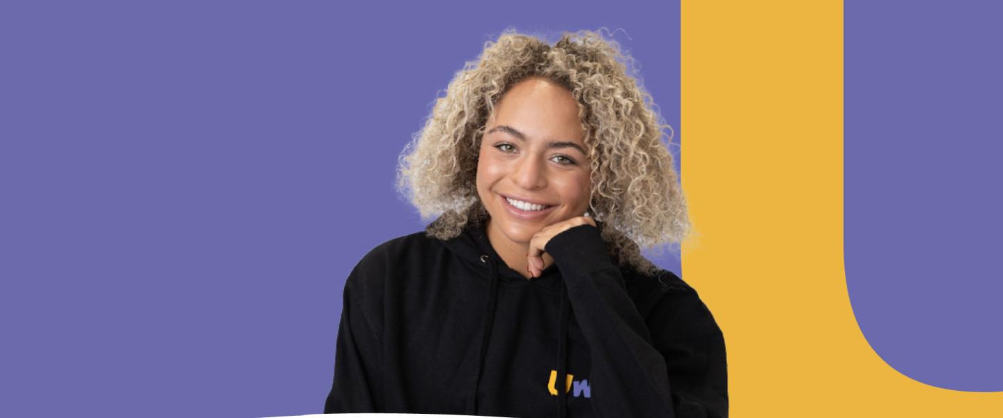 A happy student smiling at the camera