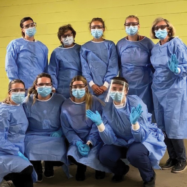 Anna van der Giessen (top middle) with co-workers.