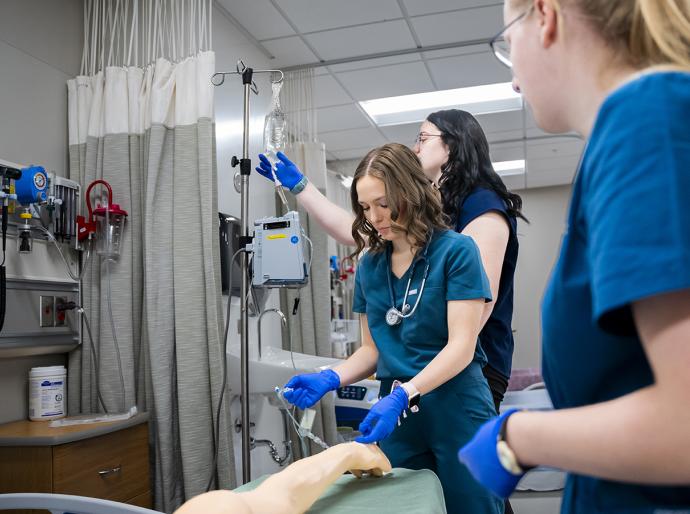 Nursing students training in the simulation lab