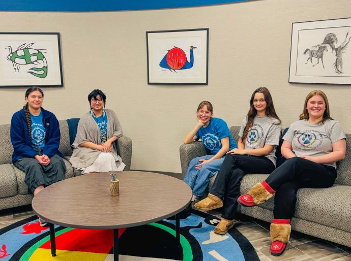 Members of the Circle of Indigenous Students visiting in the on-campus friendship centre