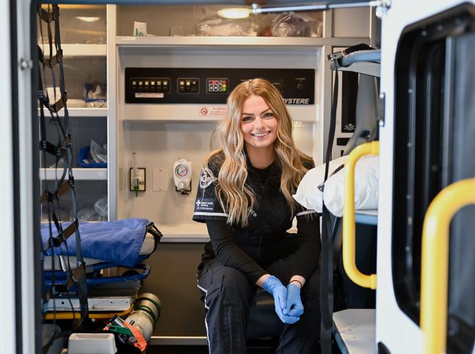 Paramedic sitting in an ambulance
