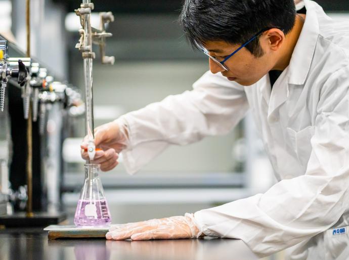 Scientist performing and experiment in the lab