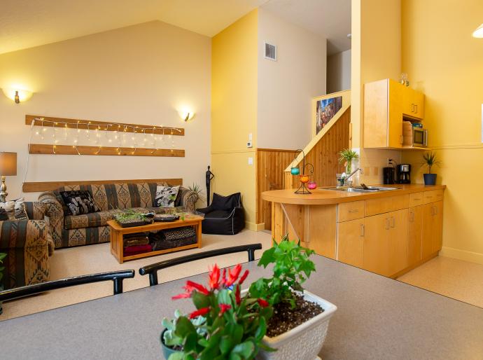 The inside of a housing unit at grande prairie campus - a cozy and inviting space