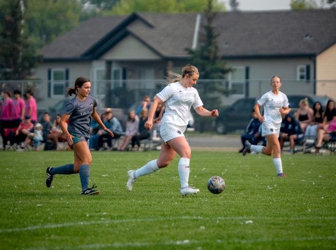 Wolves women's soccer player in action