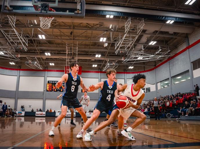 Wolves men's basketball in action