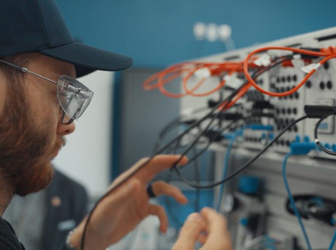 Electrical Student working with wires in the CDN Electrical Education Centre