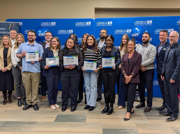 NWP Business Administration students and faculty pose in a group photo with members of the Grande Prairie & District Chamber of Commerce