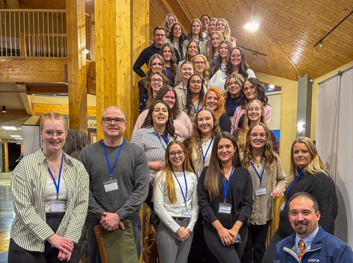 Fall and Winter Semester mentor teachers posing on a staircase