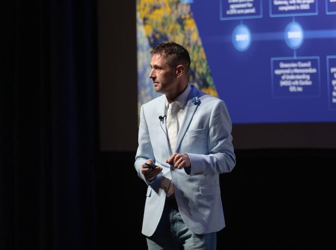 Kyle Reiling delivering a presentation at the Venture AI Conference held at NWP in October 2025