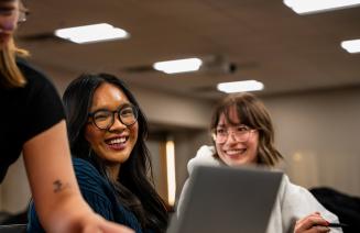 Happy student in study group