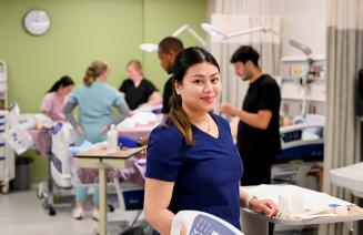 Health care student in the simulation lab