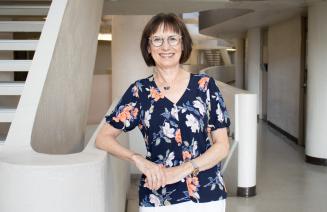 Business Instructor, Carolyn Vasileiou posing on the NWP concourse