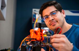 Computing science student working on a robotics project