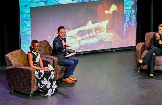 Business students on stage at the DJC Performing Arts Centre hosting the 2024 Student Business Conference.