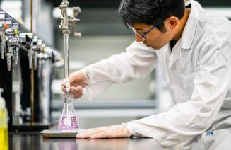 Scientist performing and experiment in the lab