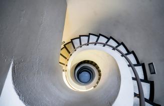 View upwards of a spiral staircase on Grande Prairie campus