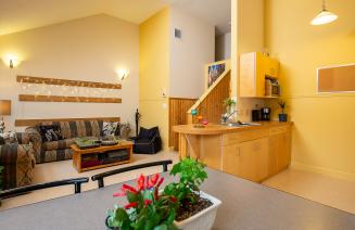 The inside of a housing unit at grande prairie campus - a cozy and inviting space