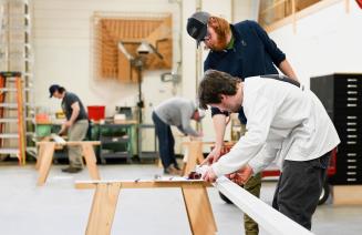 Carpentry student hard at work in the shop