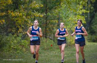 Cross country runners on the Wapiti Nordic Trail