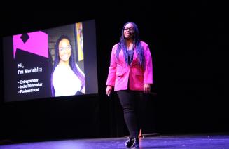 Mariah Braun, Alumni of the Business Administration program giving her keynote address at the 2025 Student Business Conference