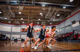 Wolves men's basketball in action