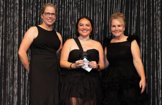 Sheila Moerkoert, Indigenous Community Impact Award Recipient flanked by NWP's Board Chair, Shawna Miller, and President and CEO, Vanessa Sheane