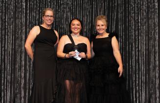 Sheila Moerkoert, Indigenous Community Impact Award Recipient flanked by NWP's Board Chair, Shawna Miller, and President and CEO, Vanessa Sheane